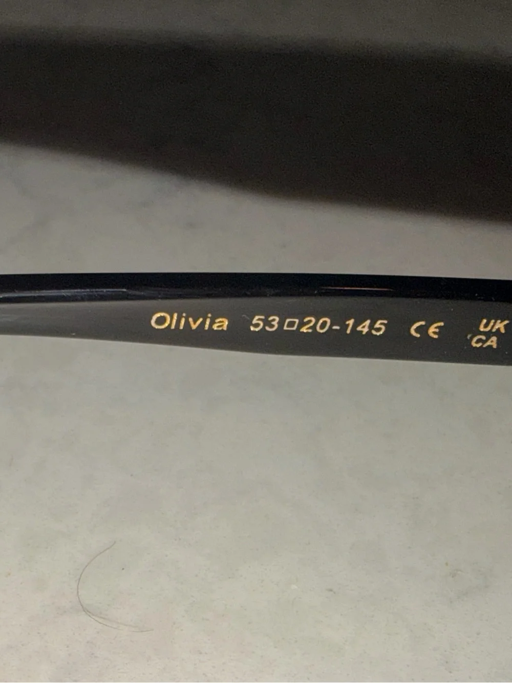Karen Wazen “Olivia” Classic Black Oval Sunglasses
